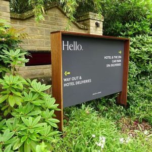 Metal Directional Sign with Wooden Frame and Stand