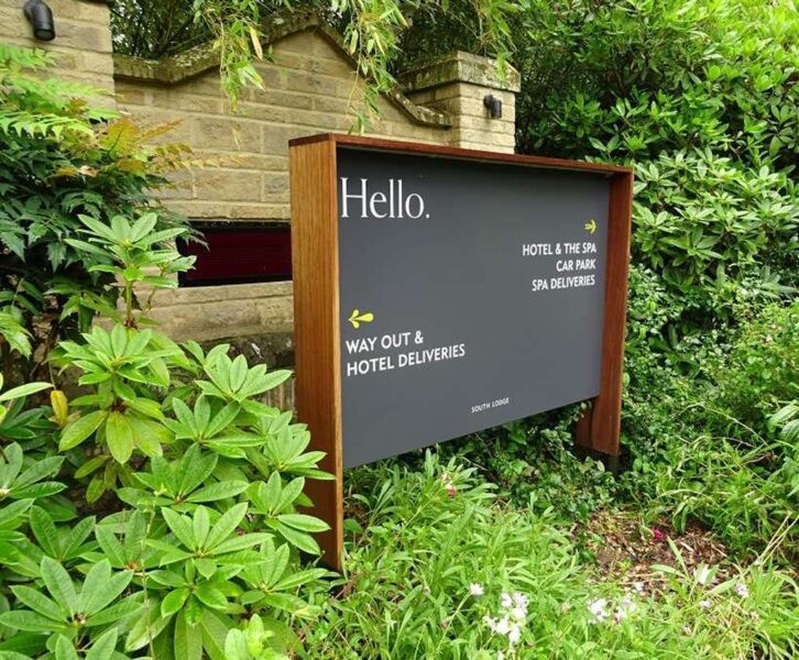Metal Directional Sign with Wooden Frame and Stand