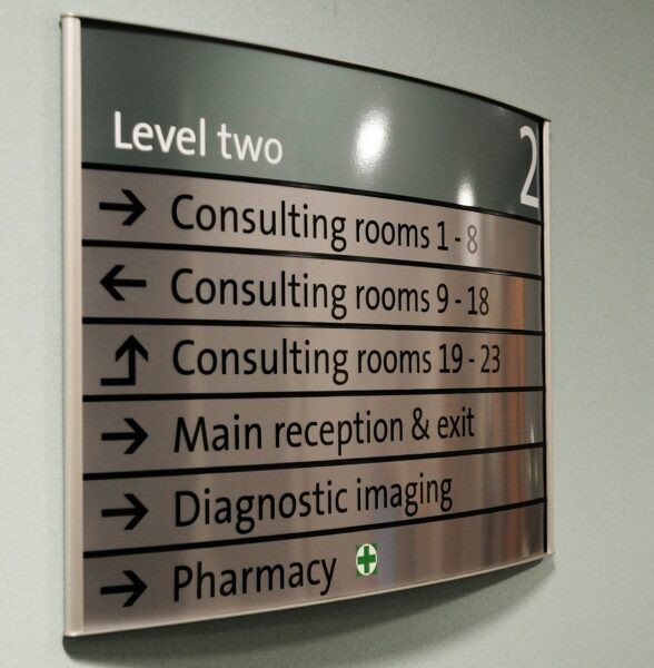 Curved Stainless Directional Sign with Acrylic
