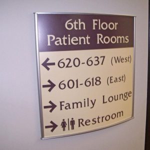 Curved Metal Directional Sign