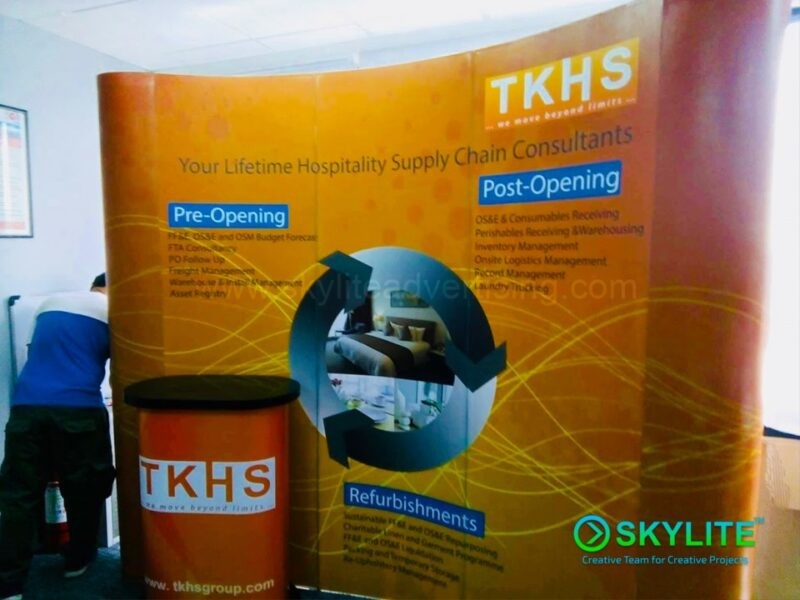 Portable Backdrop with Graphics and Table