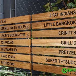 Wooden Building Directional Sign